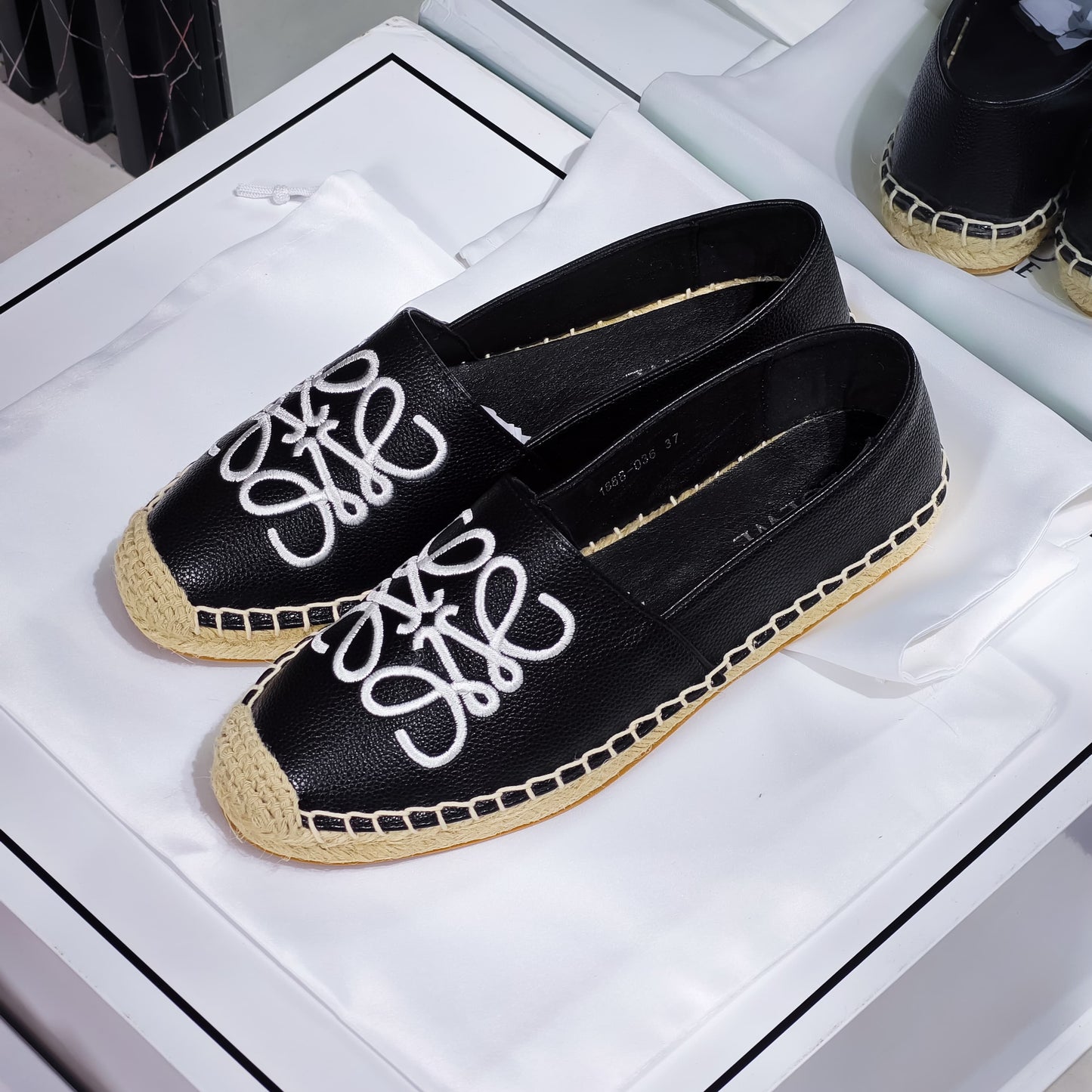 Black Leather Espadrilles with Embroidered Monogram Design
